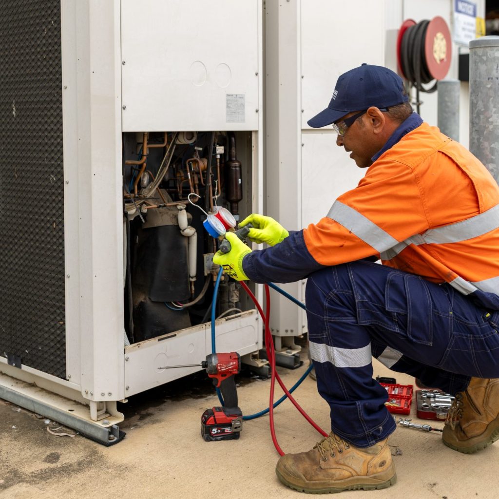 Simon working on air-con unit